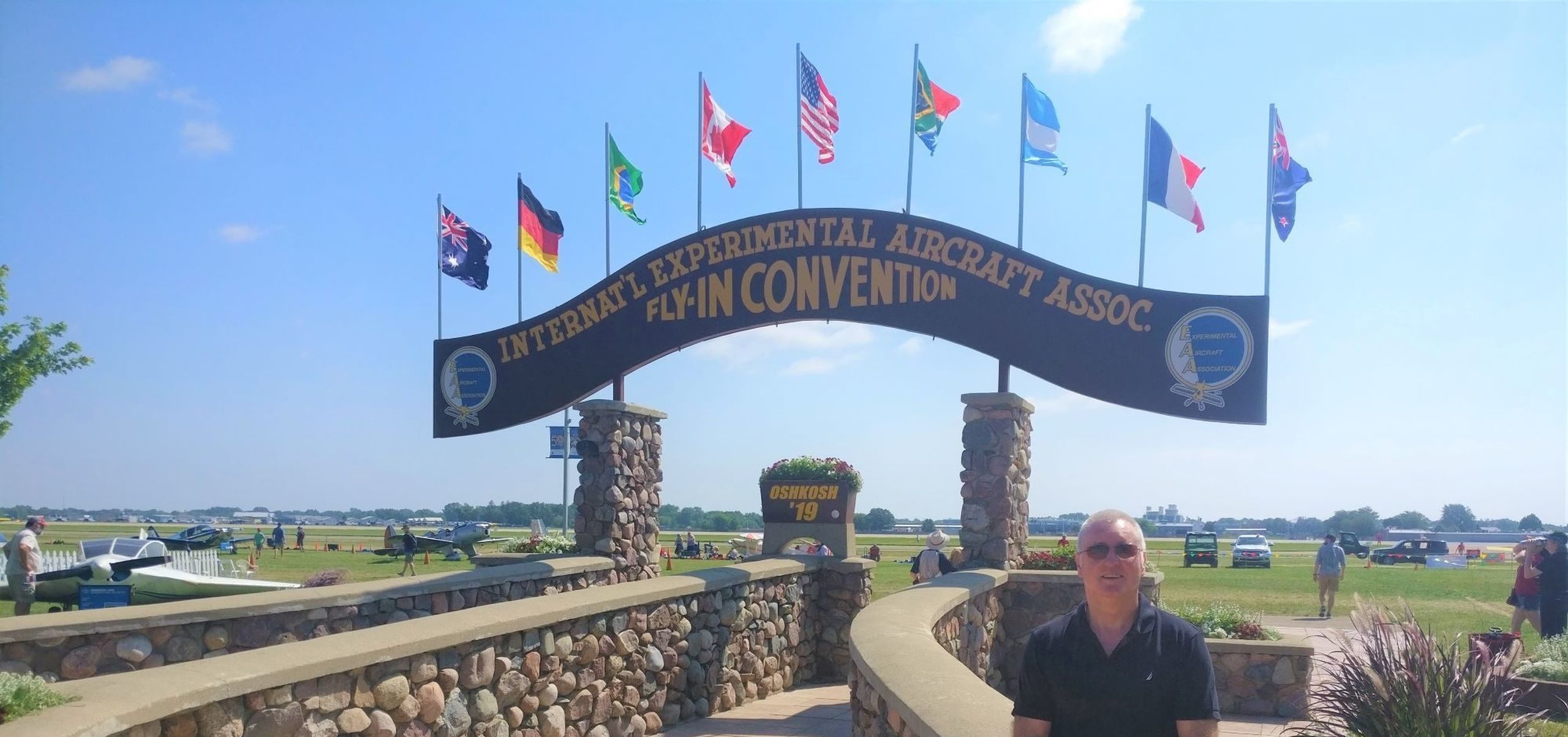 Oshkosh entrance banner with Dave Limmer web